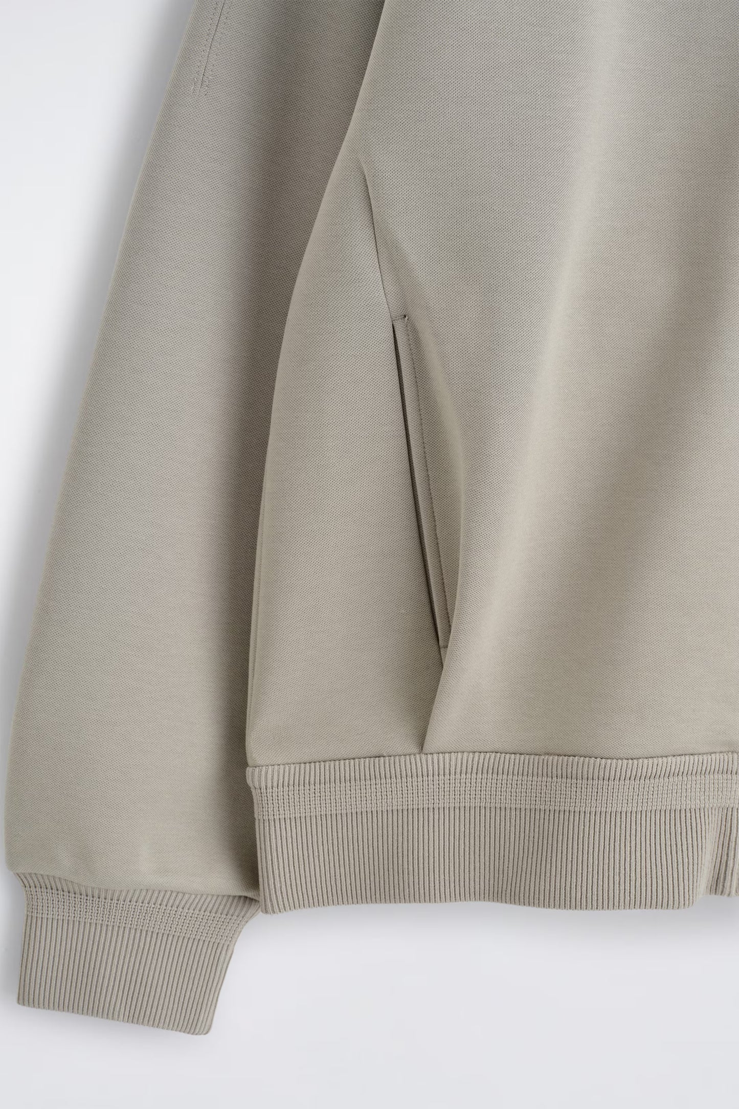 PIQUÉ ZIP-UP HOODIE